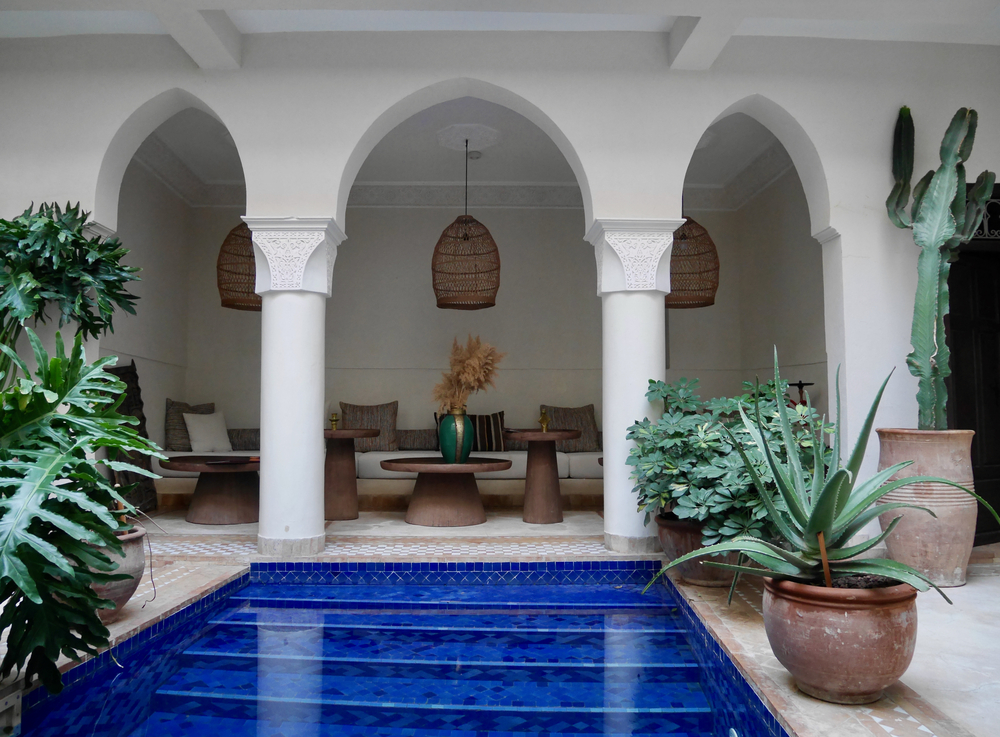 Riad in Marrakech with pool Marrakech, Morocco, 24.10.2021. Courtyard with pool and lounge area at a traditional riad